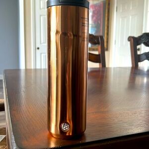 Starbucks vac/insulated Tumbler . 20oz. Beautiful shiny copper color.